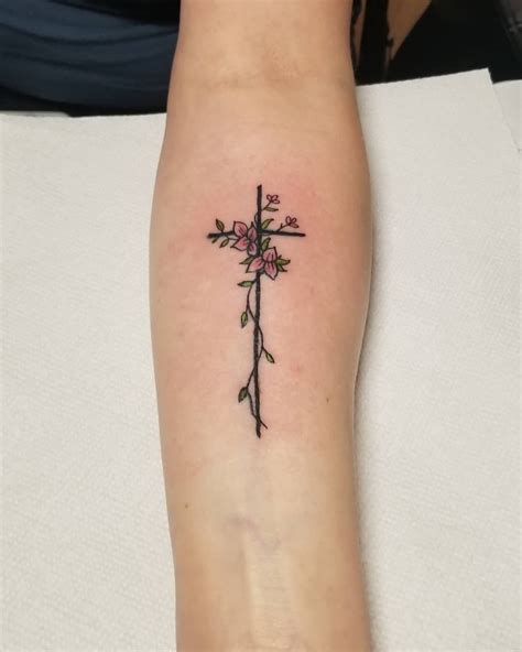 small cross with flowers tattoo|simple cross with flowers tattoo.